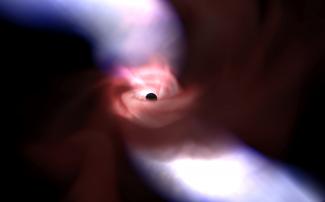 Visualization of a simulated black hole with jets. (Visualization: Ralf Kaehler Simulation: Jonathan McKinney, Alexander Tchekhovskoy, Roger Blandford.) Visualization of a simulated black hole with jets. (Visualization: Ralf Kaehler Simulation: Jonathan McKinney, Alexander Tchekhovskoy, Roger Blandford.)